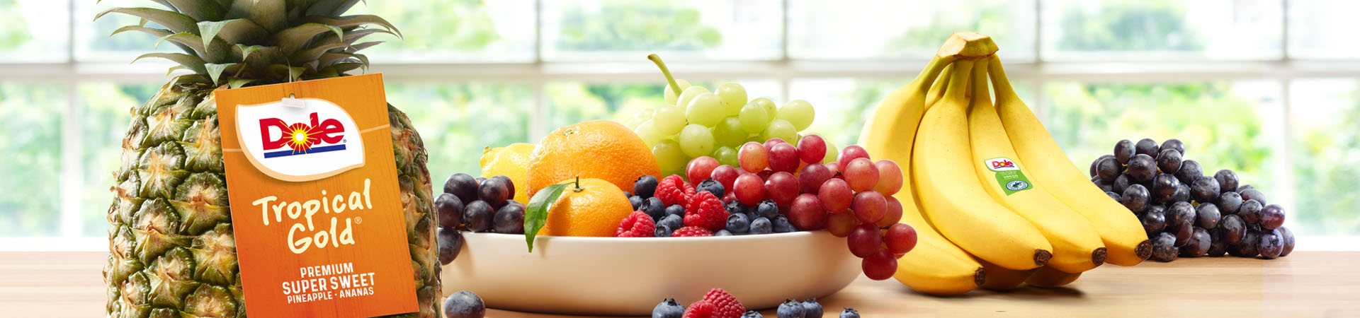 Grafik der Produktvielfalt von Dole mit verschiedenen Früchten.